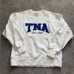 Aritzia TNA White Sweatshirt with Blue Logo